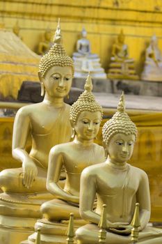 Image of golden buddha statue in temple in province tak. Thailand. (Wat Phra Mahathat)