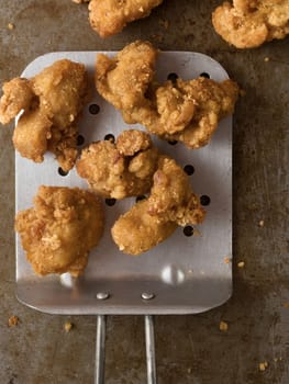 close up of rustic popcorn fried chicken nugget