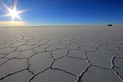 Van on Salar de Uyuni, salt lake, is largest salt flat in the world, altiplano, Bolivia, South America