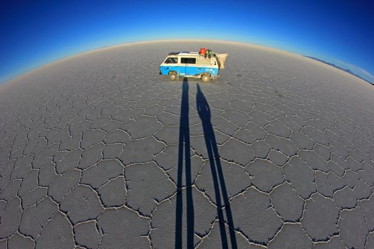 Van on Salar de Uyuni, salt lake, is largest salt flat in the world, altiplano, Bolivia, South America, fisheye perspective