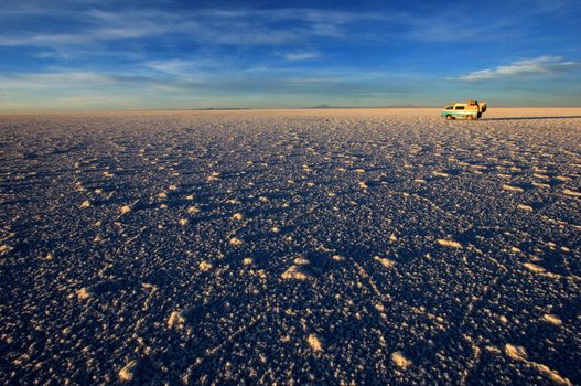 Van on Salar de Uyuni, salt lake, is largest salt flat in the world, altiplano, Bolivia, South America