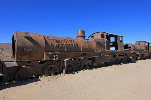 Graveyard of rusty old trains in the desert of Uyuni, Bolivia