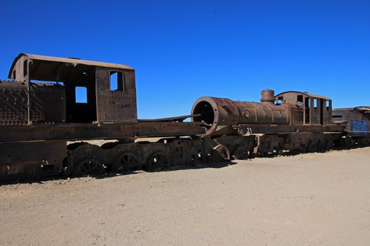 Graveyard of rusty old trains in the desert of Uyuni, Bolivia