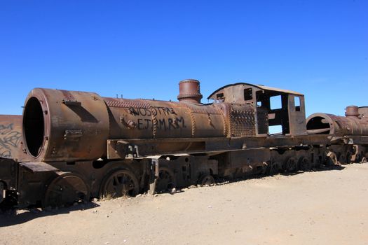 Graveyard of rusty old trains in the desert of Uyuni, Bolivia