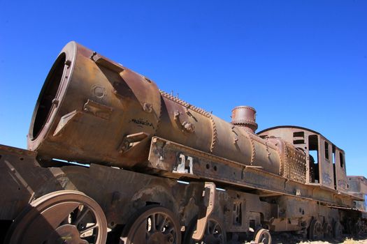 Graveyard of rusty old trains in the desert of Uyuni, Bolivia