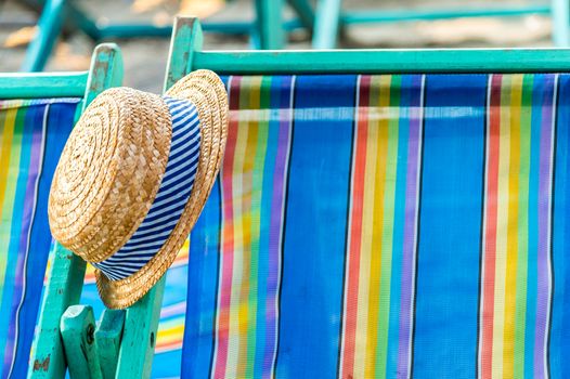 Woven hat on the beach chair