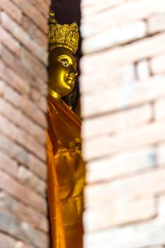 Golden Guanyin statue in Thai temple