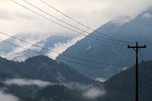 Cloudforest Ecuador mountains with phone mast in front. On the way down to the amazonas basin.