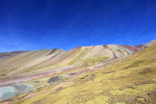 Along the hike up to the Rainbow Mountain near Cusco Peru. Not less colorful. Located about 20km south of Ausangate mountain.