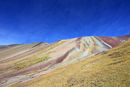 Along the hike up to the Rainbow Mountain near Cusco Peru. Not less colorful. Located about 20km south of Ausangate mountain.