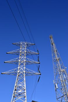 A high voltage pylon and a GSM antenna