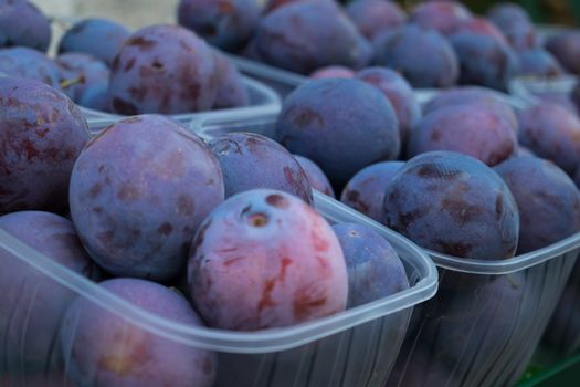 A lot of plum fruits in a shop