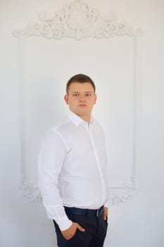 portrait of a man in a white shirt