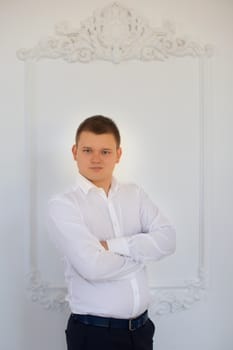 portrait of a man in a white shirt