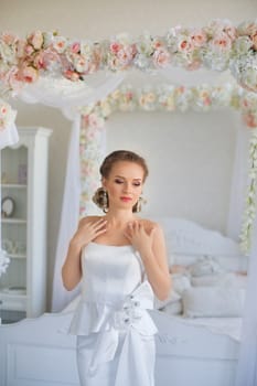 Portrait of a girl in a white dress close-up