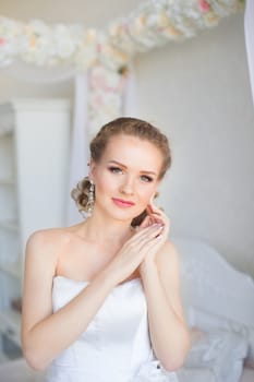 Portrait of a girl in a white dress close-up