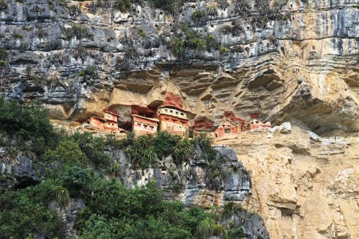 Pre inca mausoleum Revash in the mountains of northern Peru. Famous for the built in the wall and for the colorfull red and brown paintings.