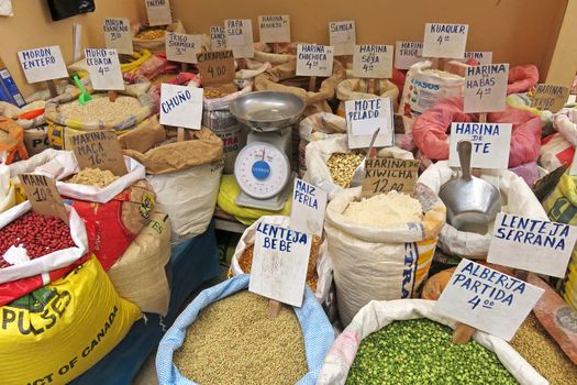 Bags with flour, maize and others at the market in Celendin, Peru, South America.