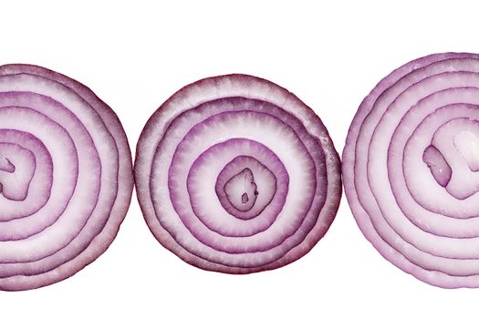 Slices of red onion isolated on white background, close up.