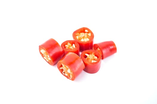 Red chilli pepper slices isolated on white background.