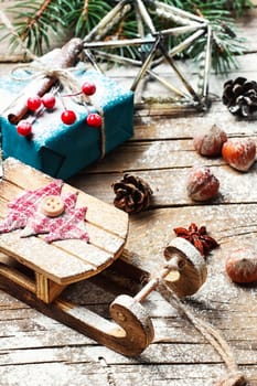 Christmas decoration with sleigh of Santa Claus and gifts