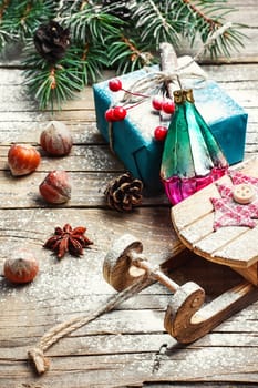 Christmas decoration with sleigh of Santa Claus and gifts