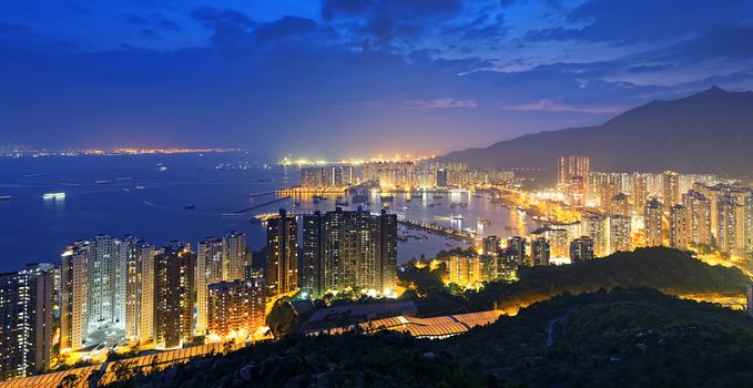 Hong Kong Tuen Mun skyline and South China sea at night