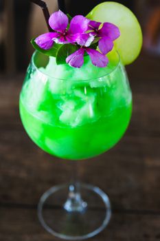 Green apple frappe and flower decoration, selective focus