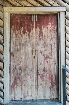 Old scratched wooden door