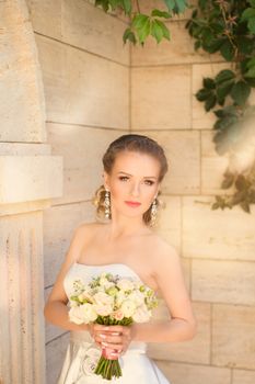 Portrait of the bride close-up on the street