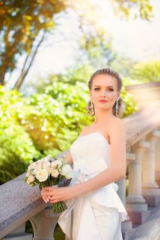 Portrait of the bride close-up on the street