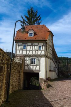 Residential tudor style house , with blue sky in background. Castle Neuenb rg in Germany.