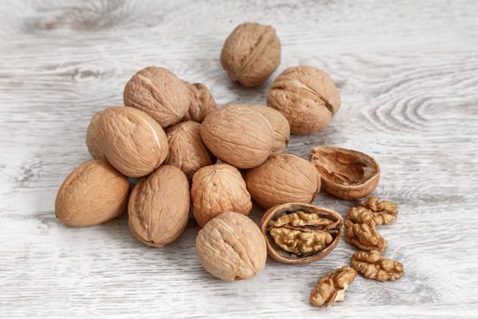 Walnuts whole in their skins, chopped, nut hulls, walnut kernels