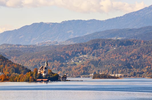 Sunny autumn day on the lake in mountains of south Austria, Carinthia