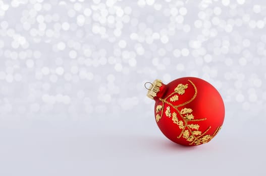 Christmas balls with lights snow winter background. Space for copy.