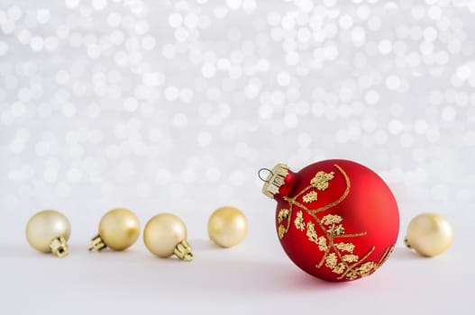 Christmas balls with lights snow winter background. Space for copy.