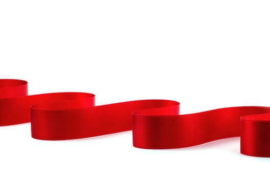 Red satin ribbon isolated on white background