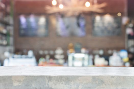 Concrete table top with blurred coffee shop interior for background