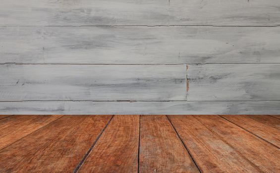 Perspective table top with white wooden wall background, stock photo