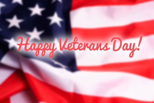 Happy Veterans Day sign on USA flag background