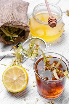 Antiviral Linden tea with honey and lemon