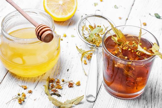 Antiviral Linden tea with honey and lemon