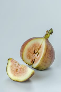 sliced fresh figs fruit on white background