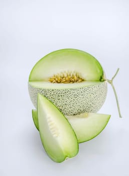 shopped green melon isolated on white background