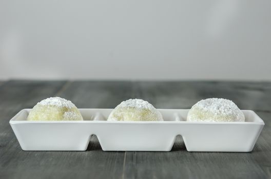 Daifuku Mochi Japanese dessert on white plate , still life