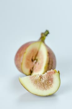 sliced fresh figs fruit on white background