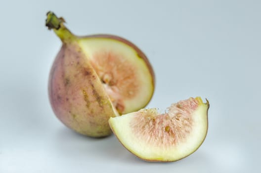 sliced fresh figs fruit on white background