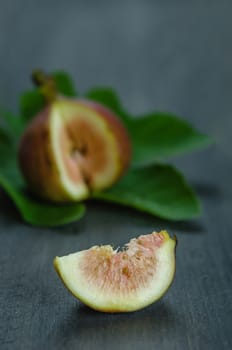 Portion of fresh Figs on wooden background