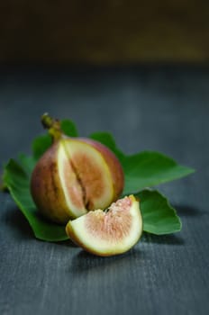 Portion of fresh Figs on wooden background