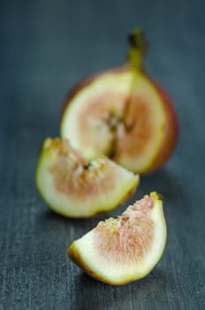 Portion of fresh Figs on wooden background